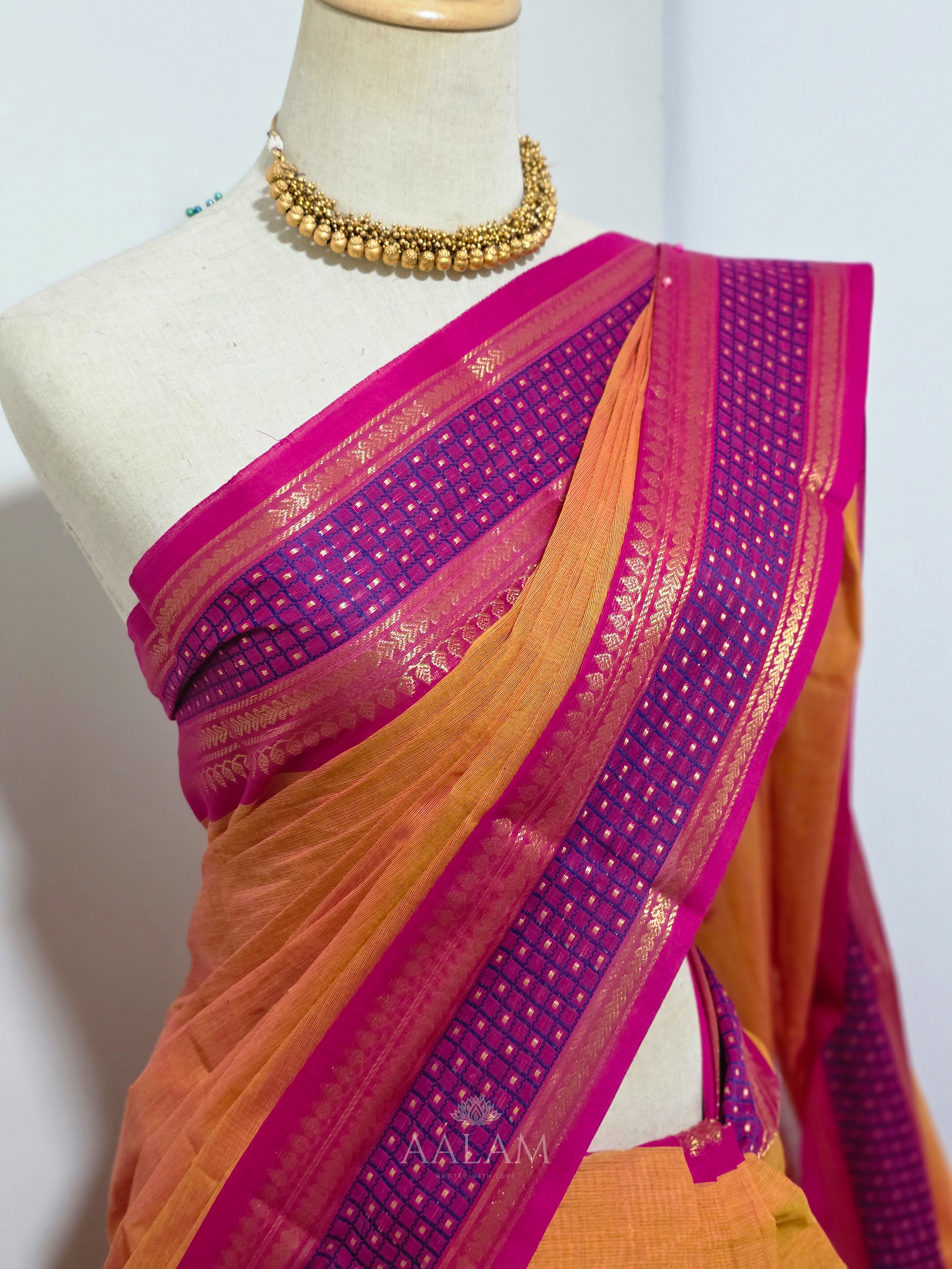 Orange Cotton Saree with Pink and Purple Border