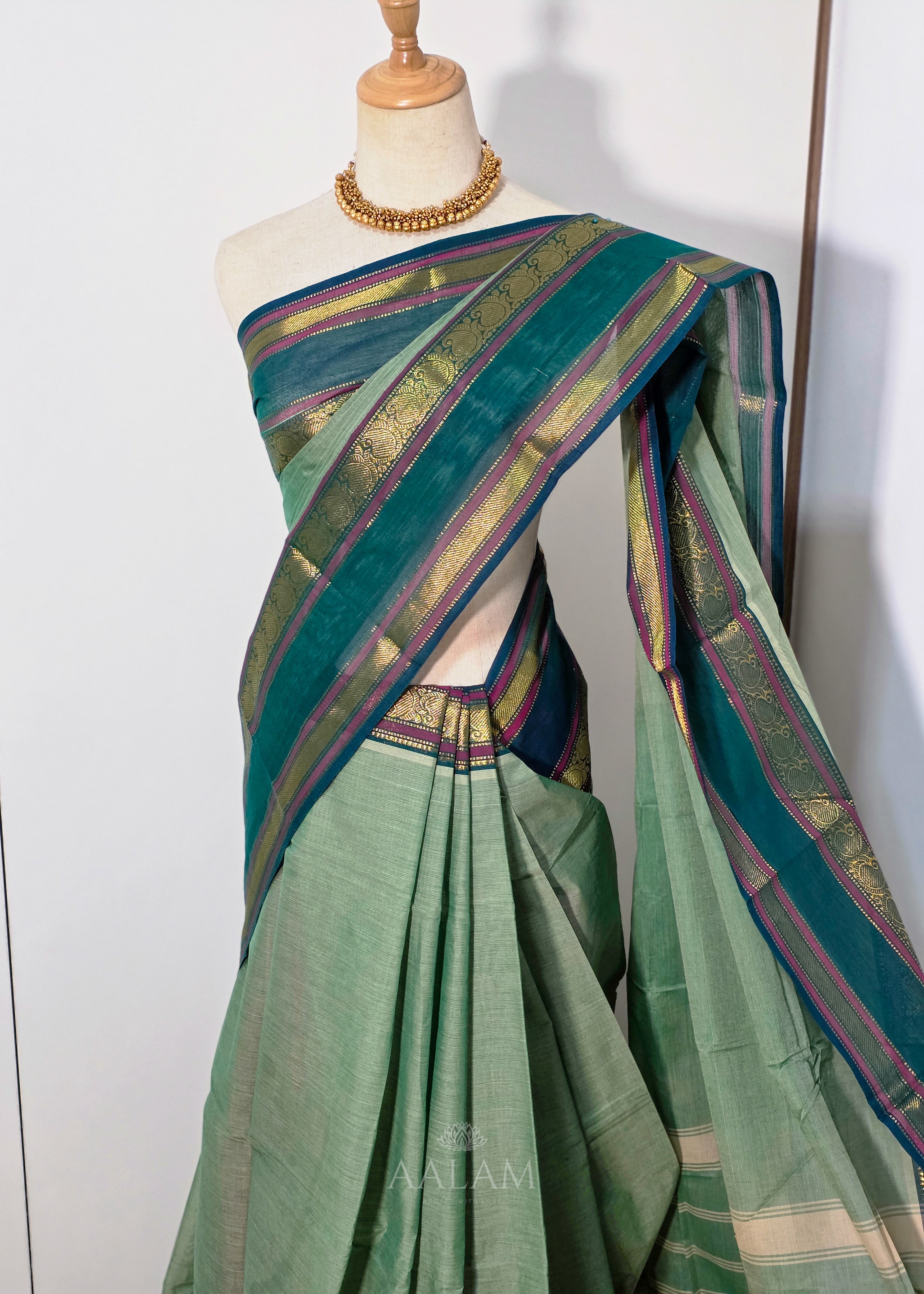 Pistachio Green Cotton Saree with Dark Green Border