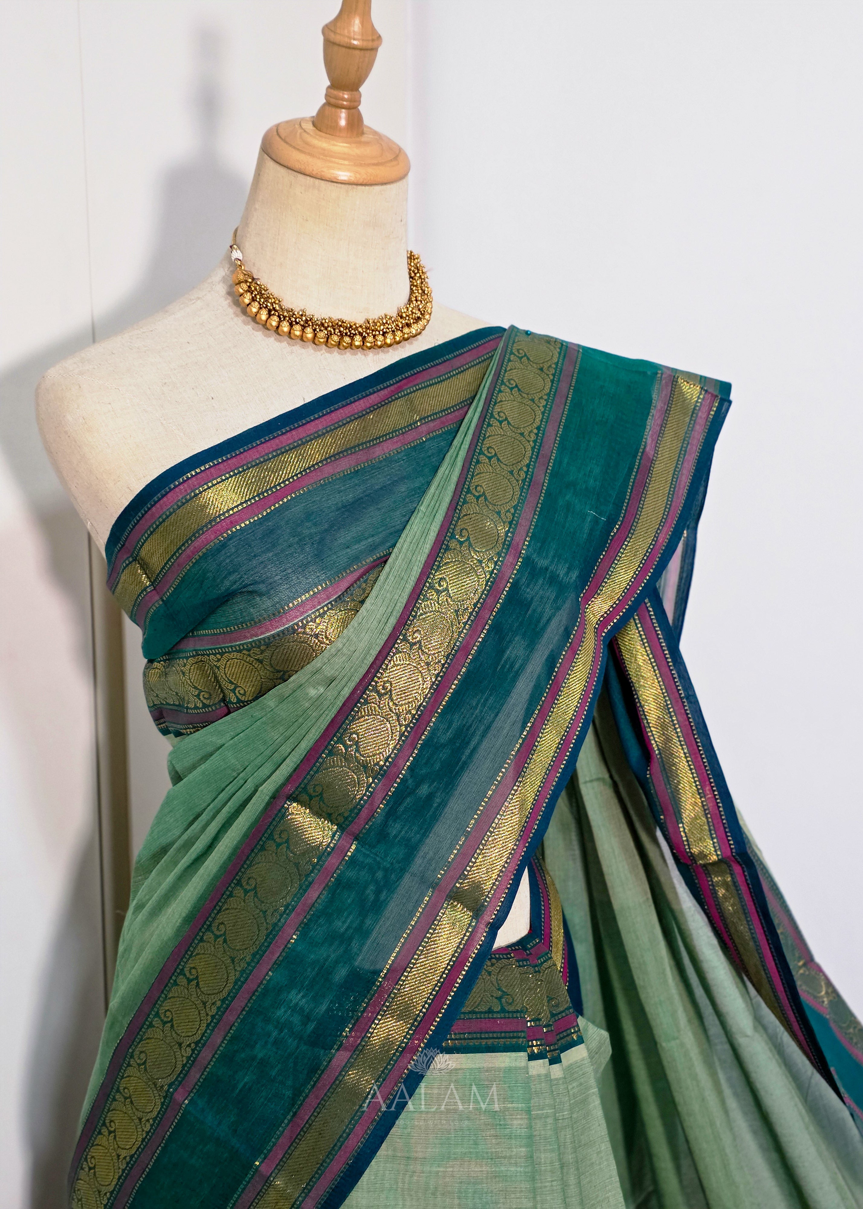 Pistachio Green Cotton Saree with Dark Green Border