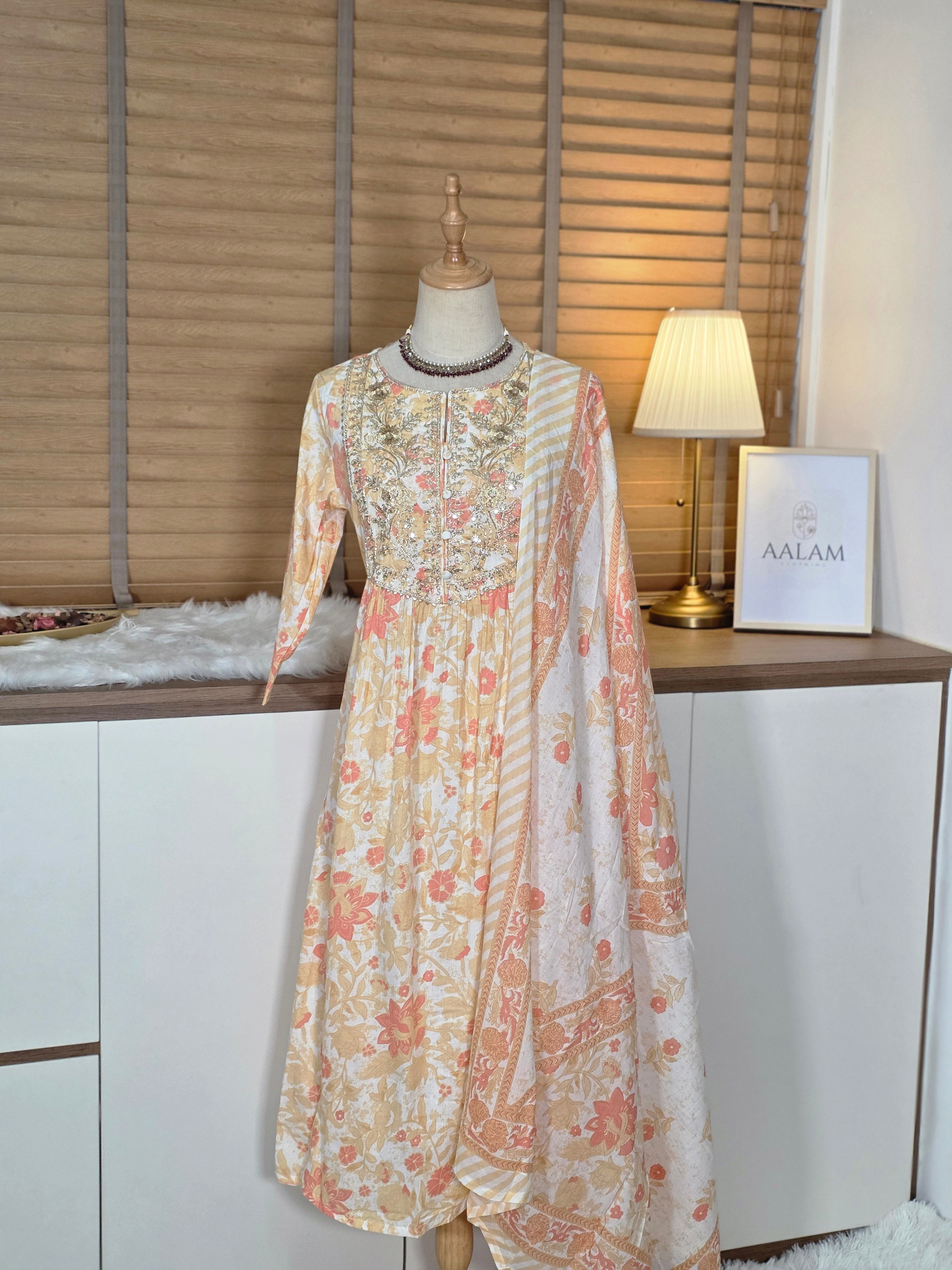 Cream Pure Cotton Floral Printed Yoke Embroidered A-line Kurta Set